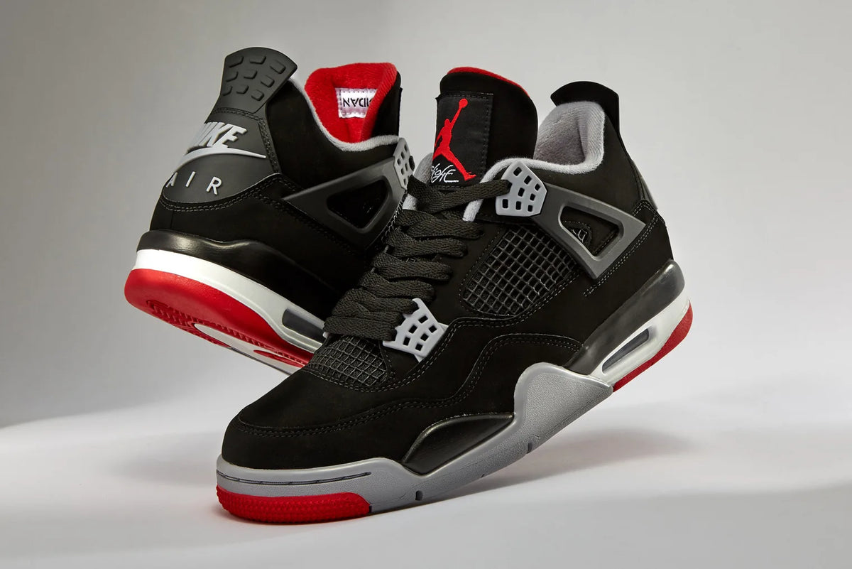 The Nike Air Jordan 4 OG 'Bred' sneakers.