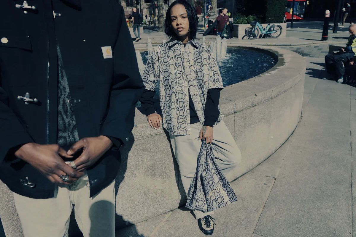 Duo wearing Carhartt WIP snake camo collection