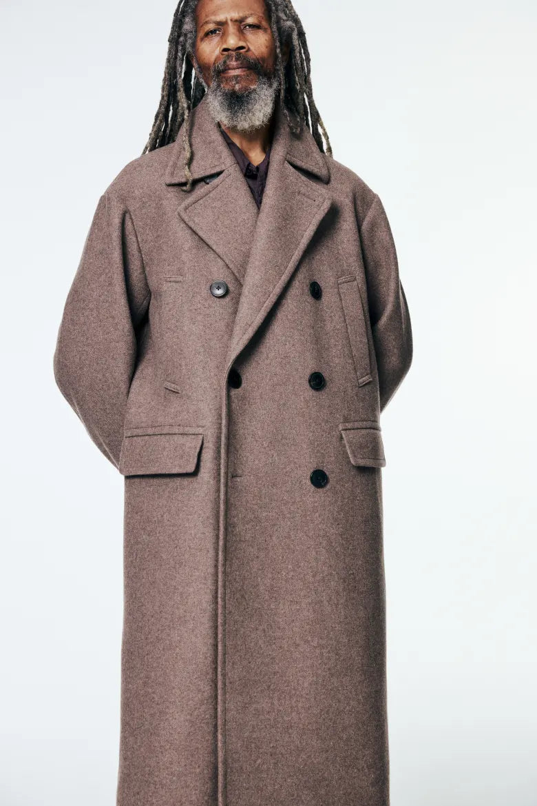A model wears Dries Van Noten Rascott Coat