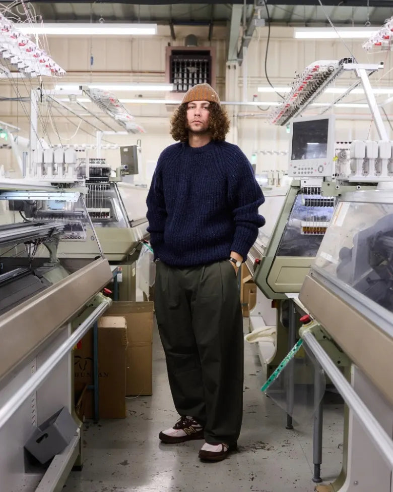 Jojo wears a Barbour knitted crewneck at the Barbour factory