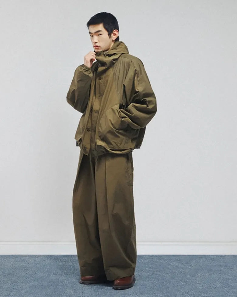 A model wears the YMC Bonehead jacket in green