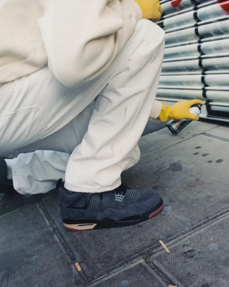 Fatso paints with Air Jordan 4 LDN Pack on foot