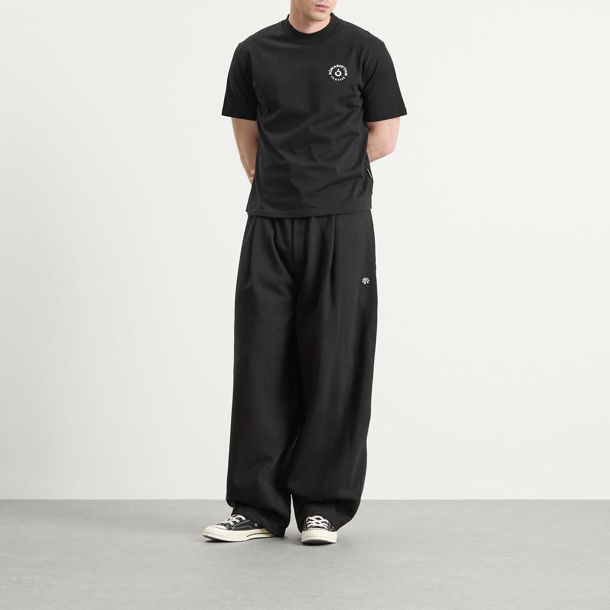 NOMARHYTHM TEXTILE Logo T-Shirt
