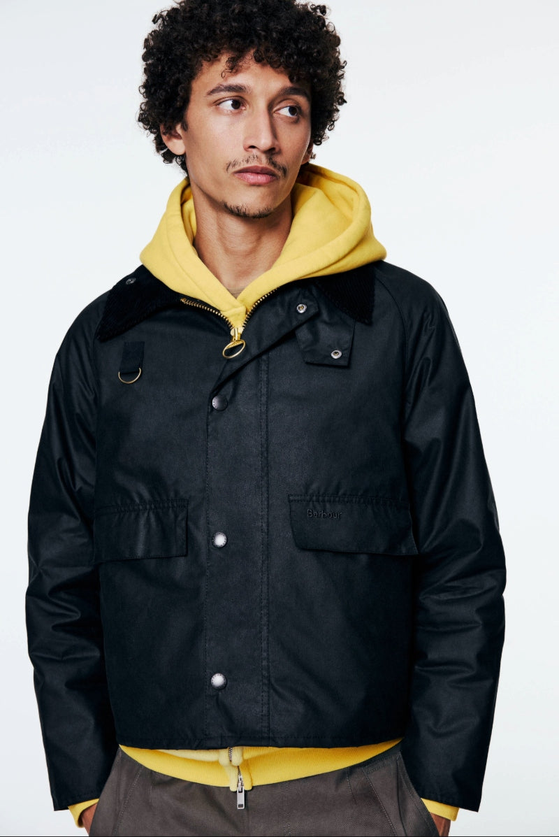 A model wears the Barbour Transporter Jacket