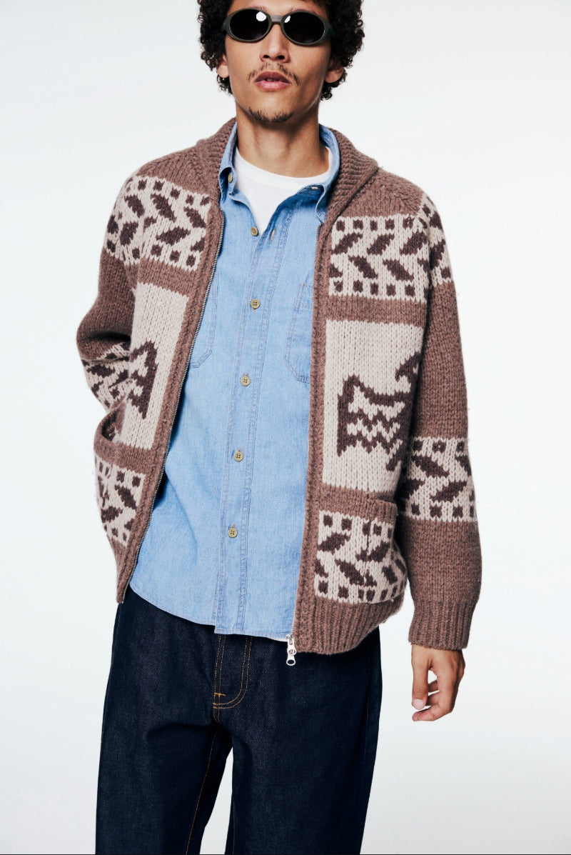 A model wearing a FrizmWORKS Cardigan
