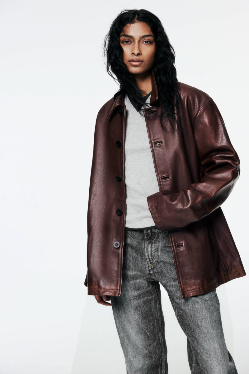 A model wears a Studio Nicholson leather jacket