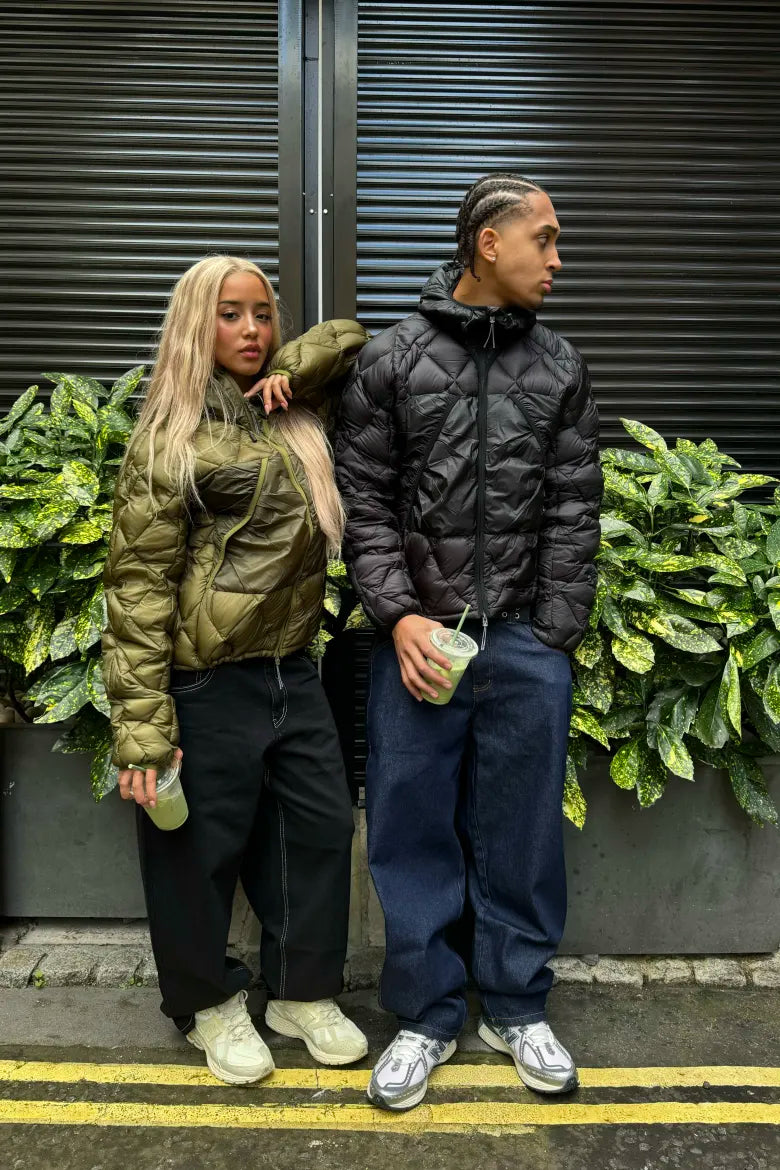 A man and woman wearing streetwear looks from an END. editorial on styling the New Balance M1906R sneaker.