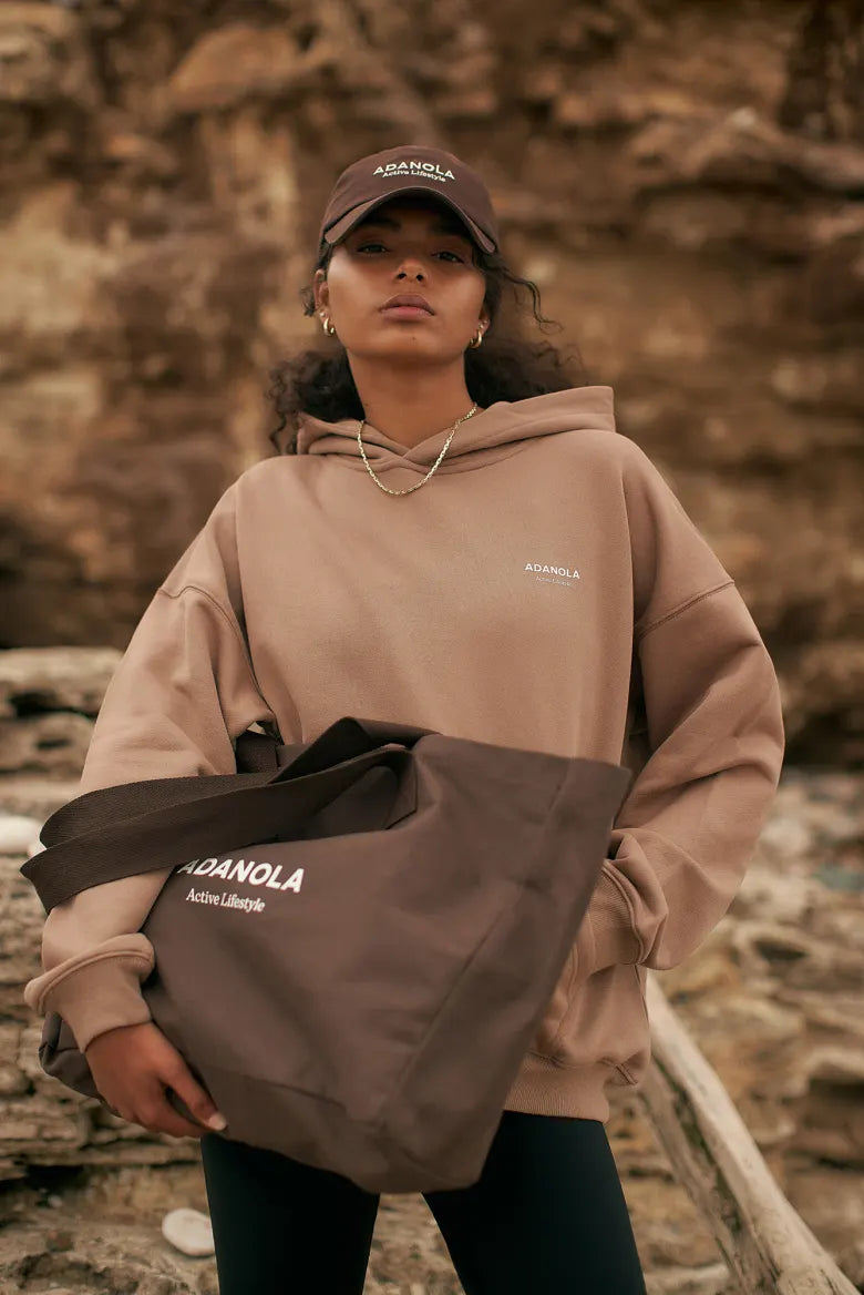 Model wearing Adanola hoodie that's exclusive to END.