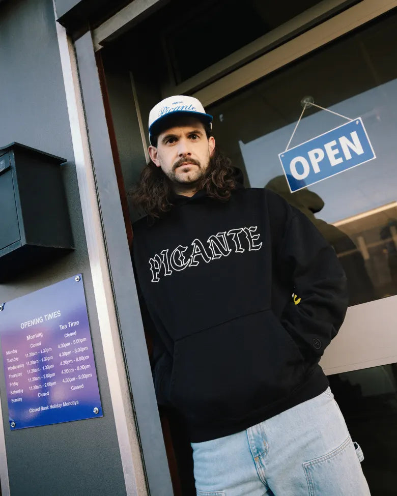 Man wearing Picante hoodie