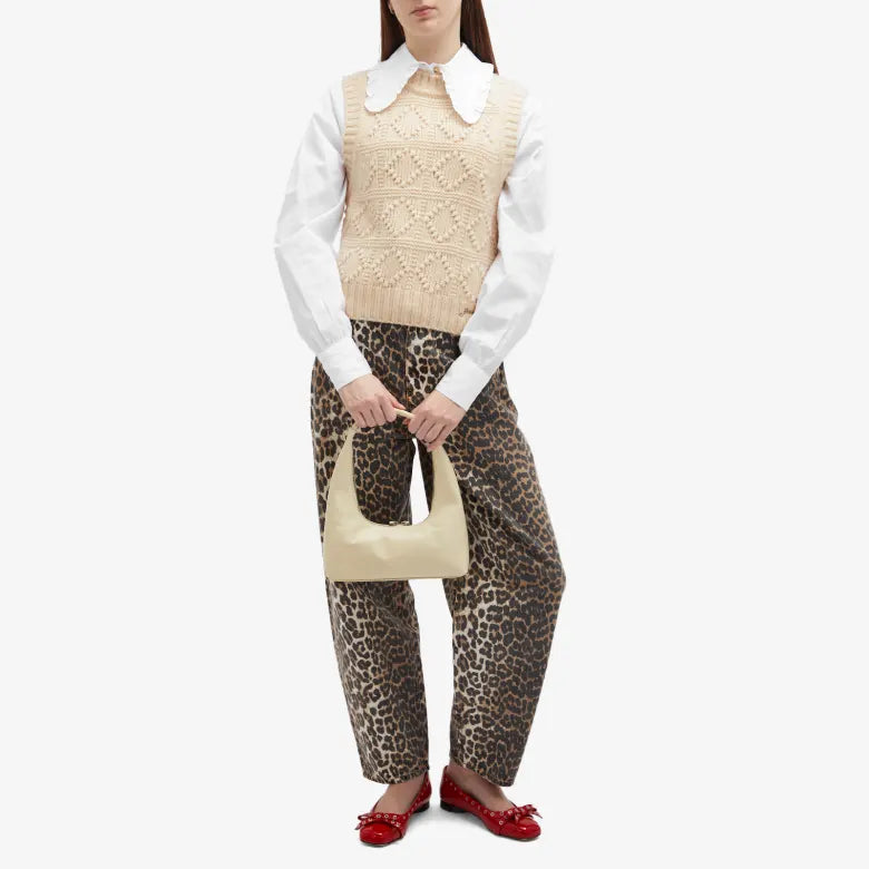 Model wearing GANNI Leopard Stary Denim Jeans