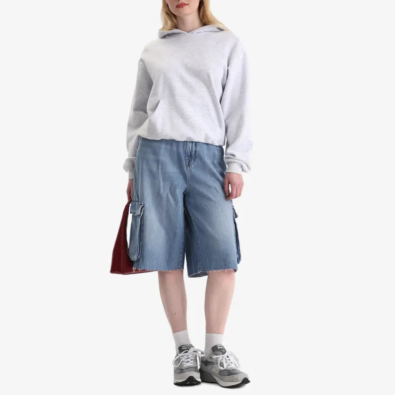 Model wearing Good American Denim Cargo Short