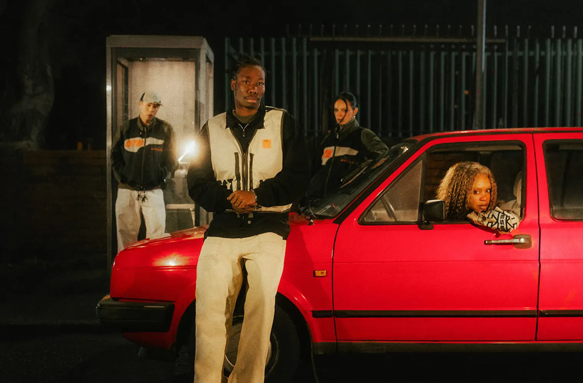 Photoshoot from END. X DIESEL collection featuring a red car and models