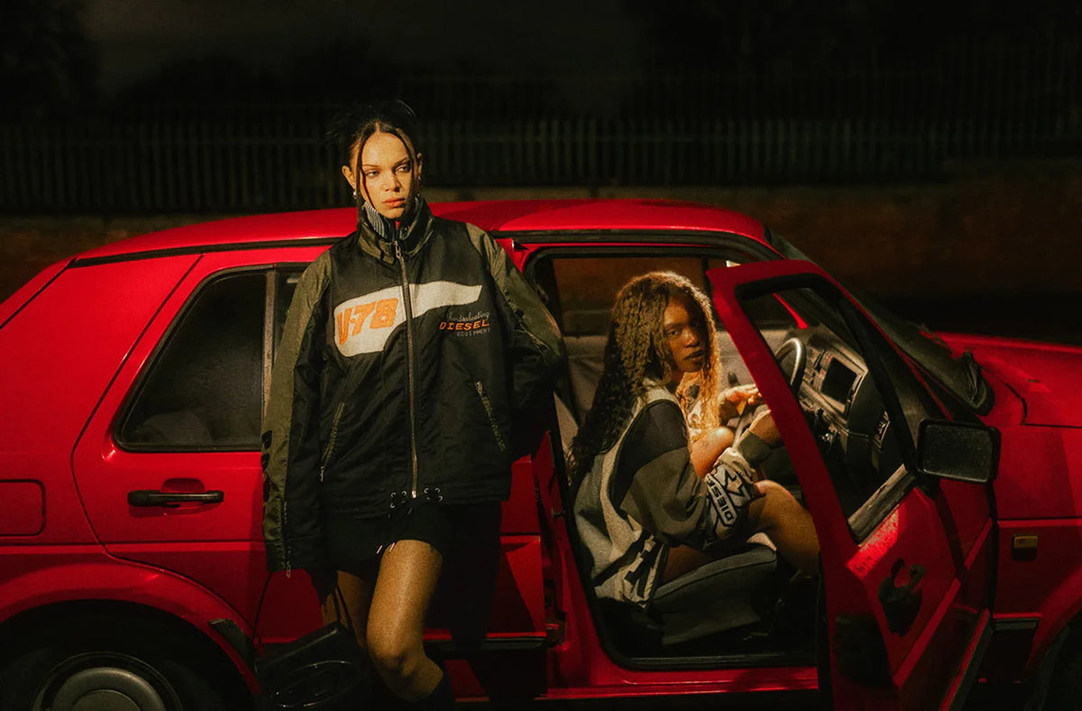 Photoshoot from END. X DIESEL collection featuring a red car and models