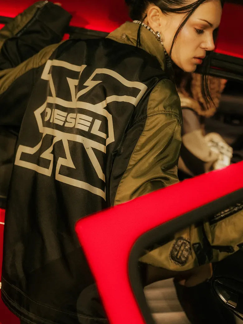 Photoshoot from END. X DIESEL collection featuring a red car and models