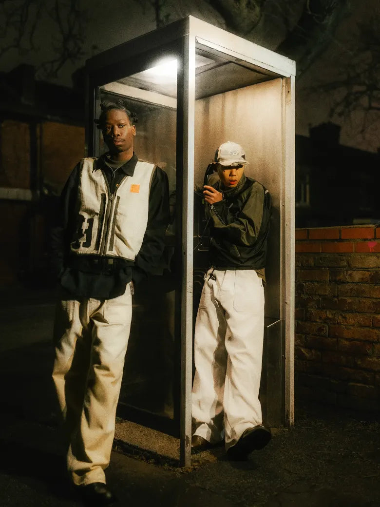 Photoshoot from END. X DIESEL collection featuring models in a phone box