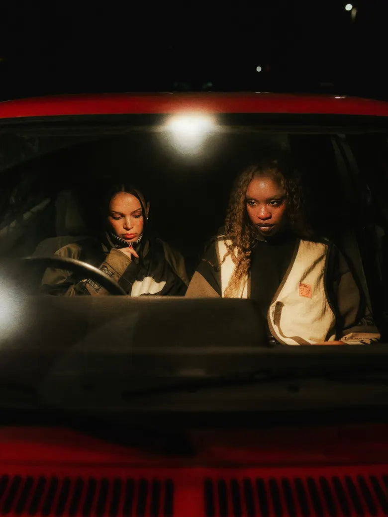 Photoshoot from END. X DIESEL collection featuring models in a red car