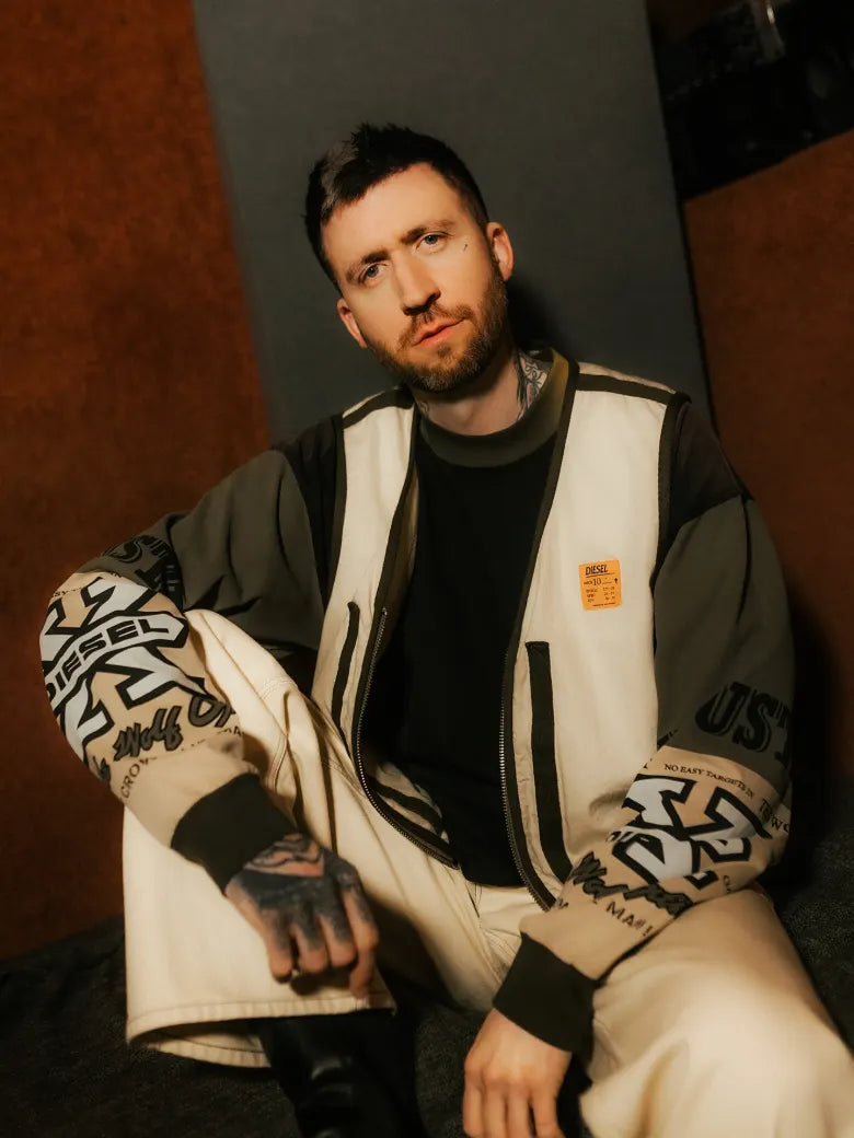 Photoshoot from END. X DIESEL collection featuring models in a vest, jumper and trousers