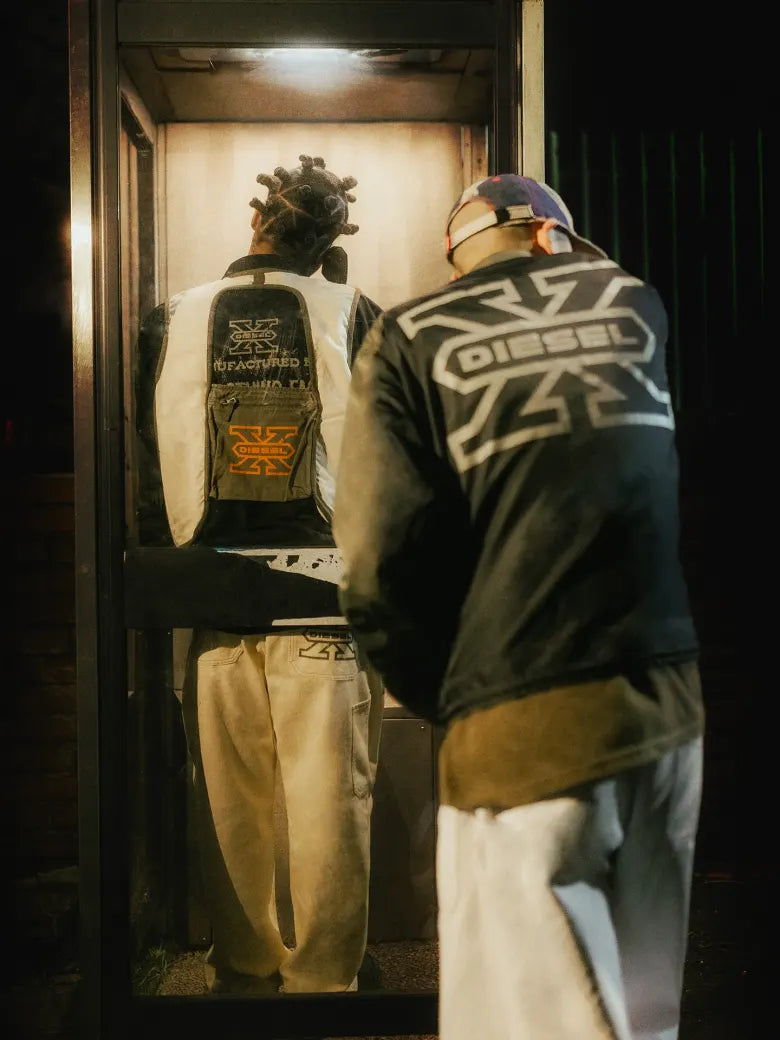 Photoshoot from END. X DIESEL collection featuring models in a phonebox