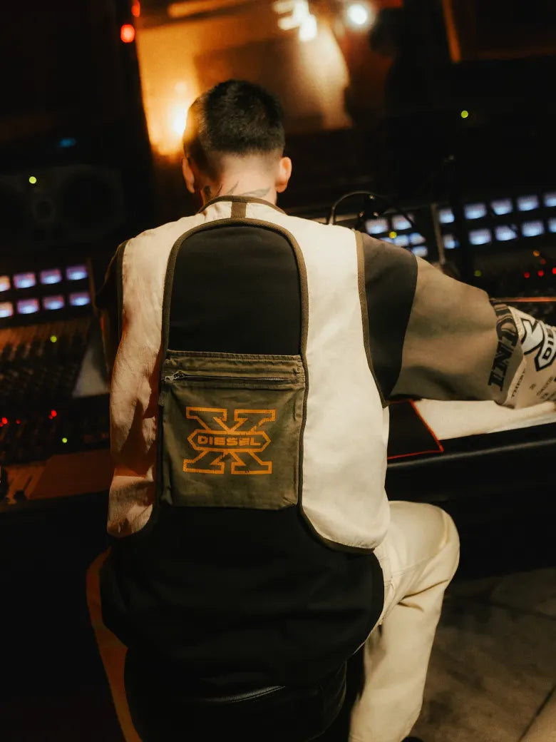 Photoshoot from END. X DIESEL collection featuring models in a vest, jumper and trousers