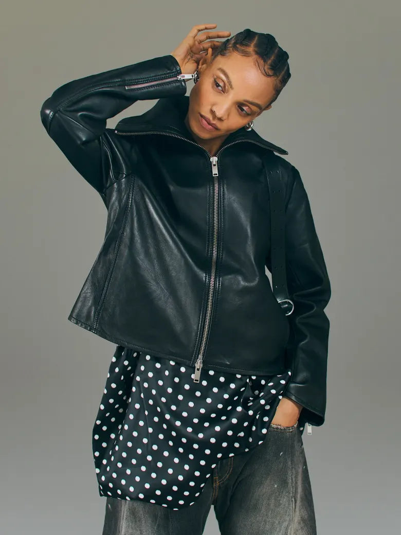 Woman wearing leather jacket