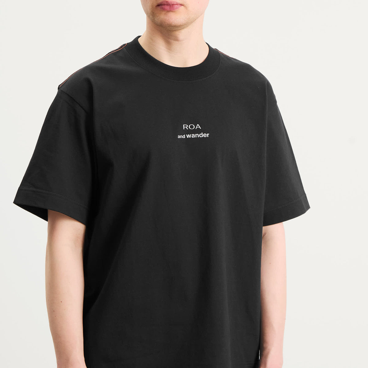and wander x ROA Logo Printed T-Shirt