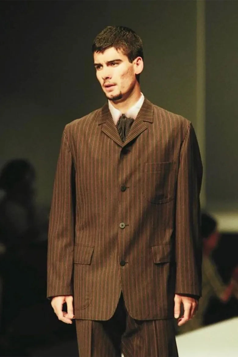 Pep Guardiola on the runway for Antonio Miro for SS93.