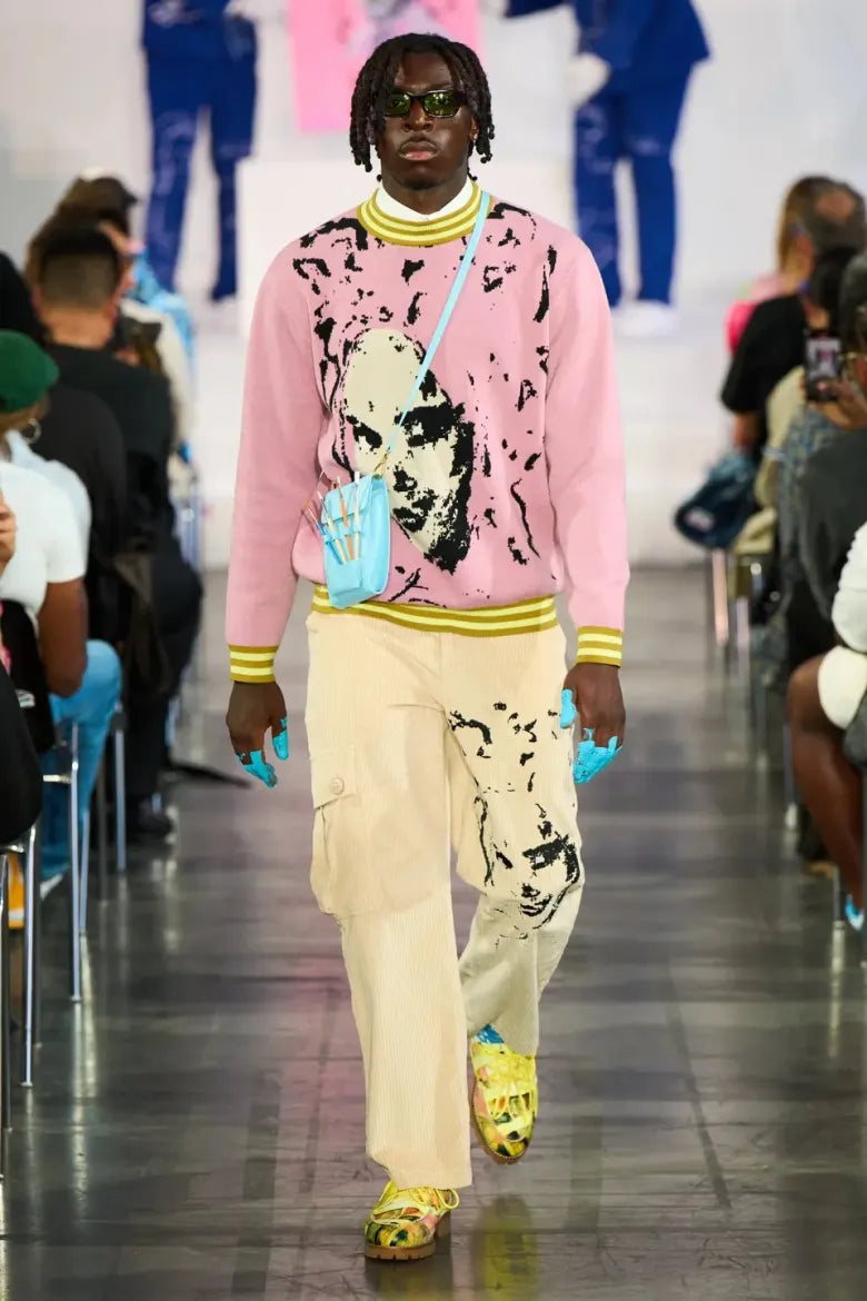 Moise Kean on the runway for KidSuper SS23.