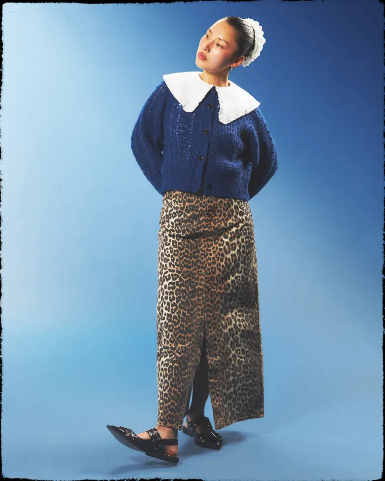GANNI loafers with leopard print trousers and knitted cardigan