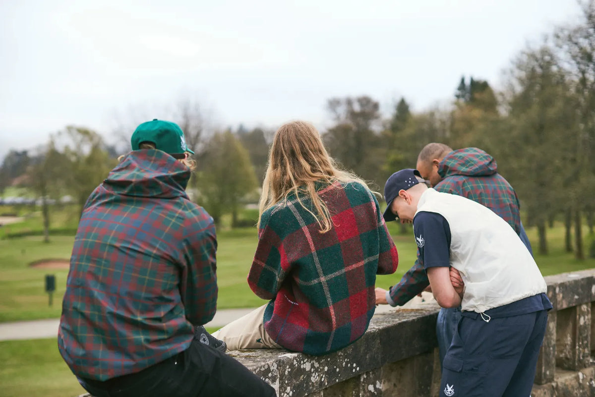 Group wearing a Pop Trading Company and Gleneagles collaboration clothing