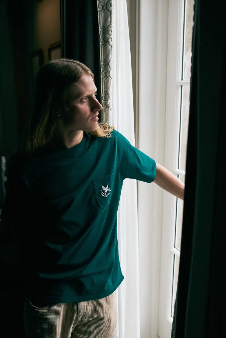 Man wearing a Pop Trading Company and Gleneagles collaboration t-shirt