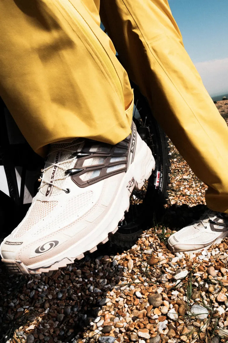 Rapper Joe James wearing Salomon running sneakers