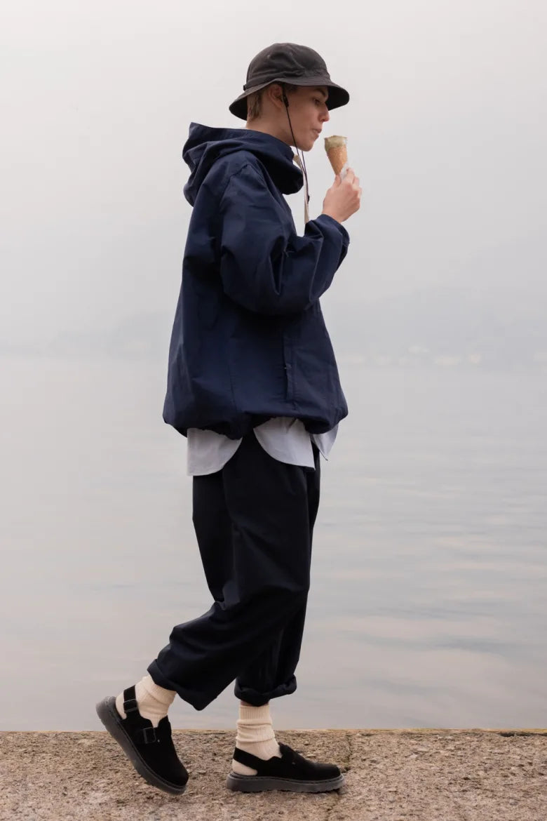 Man wearing ice cream with Dr. Martens’ Jorge Mule on feet