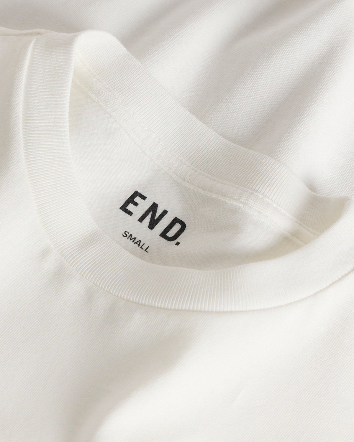 END. Monogram Baby Tee
