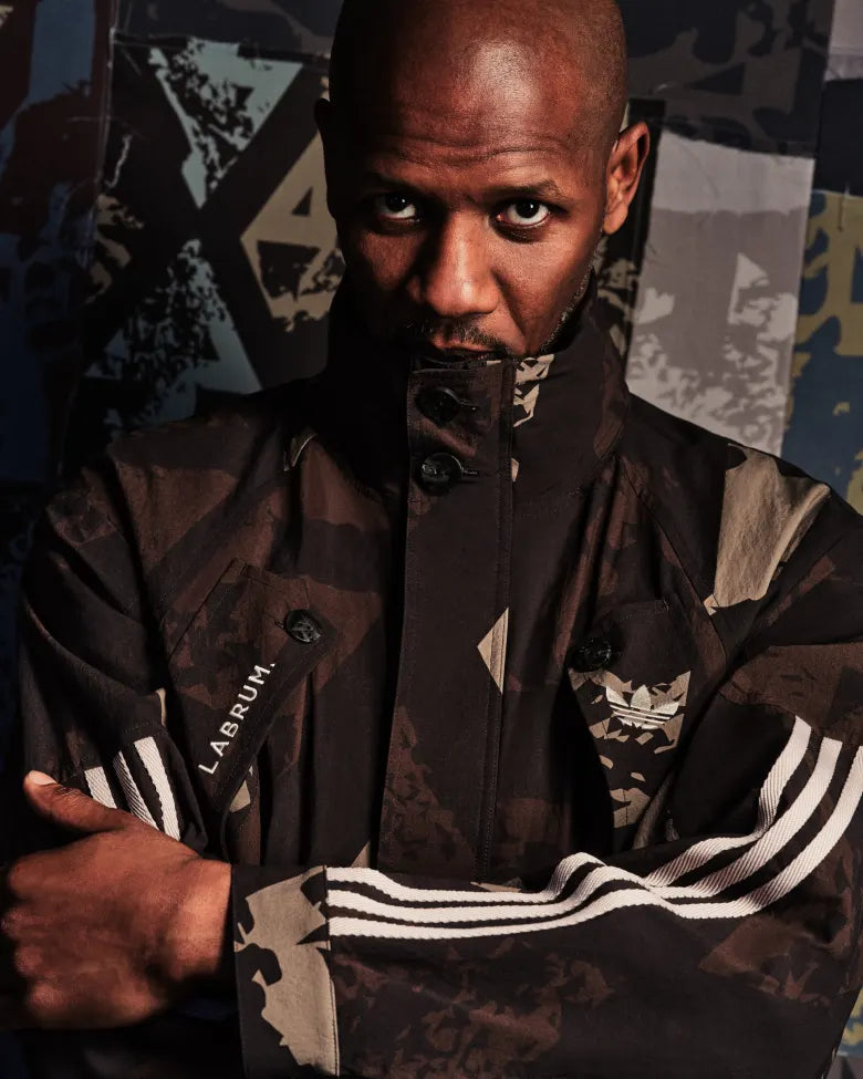 Man wearing Camo jacket from adidas Originals and Labrum bespoke collection for END.
