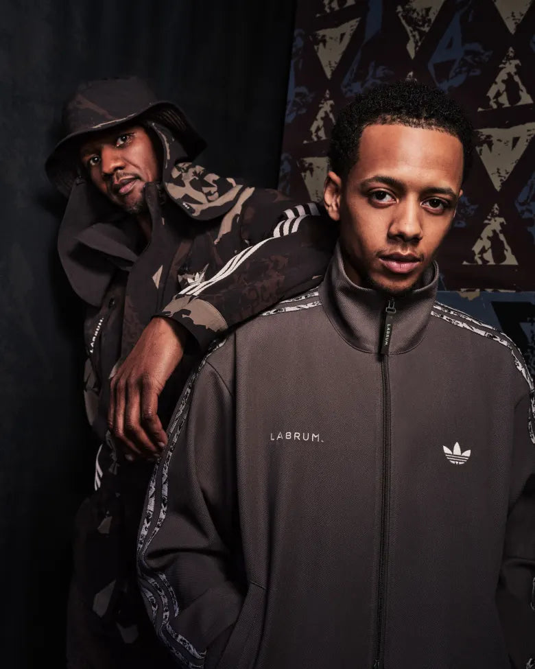 Duo wearing Camo jacket and track top adidas Originals and Labrum bespoke collection for END.