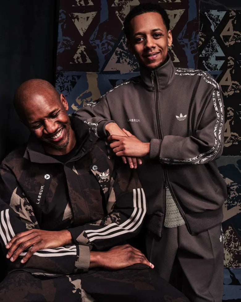 Duo wearing Camo set and tracksuit from adidas Originals and Labrum bespoke collection for END.