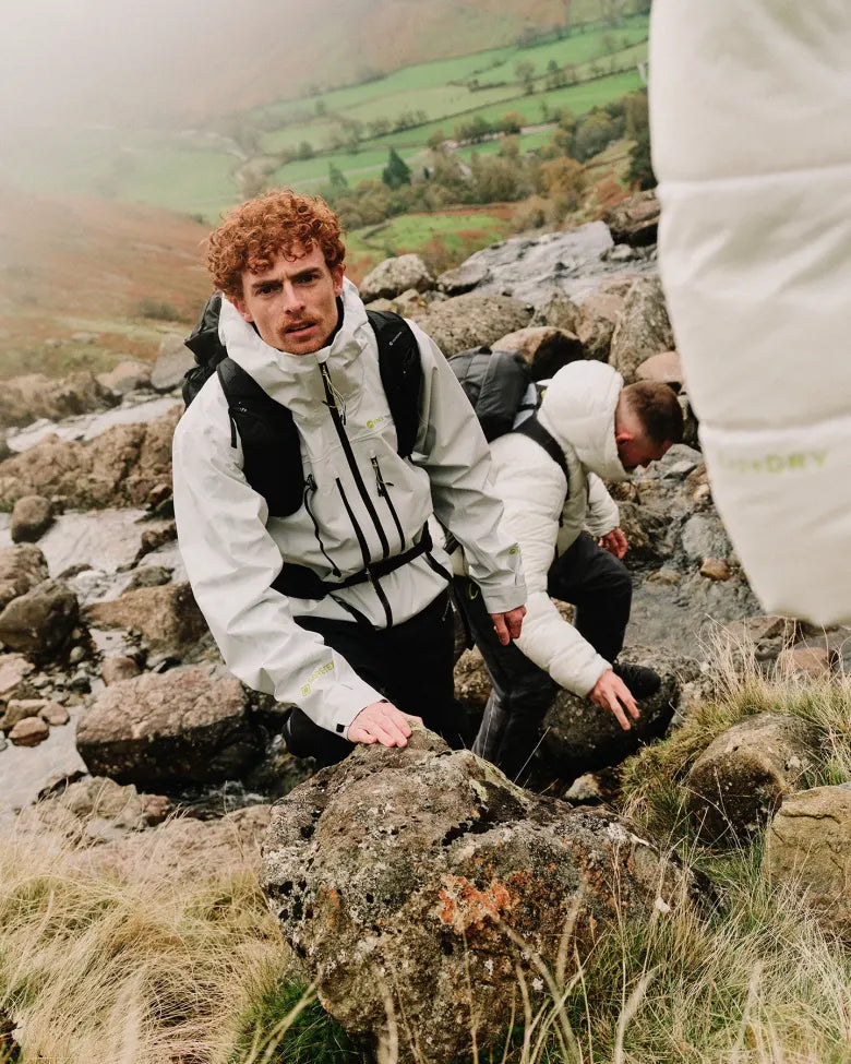 People wearing END. x Montane outerwear while on a hike.