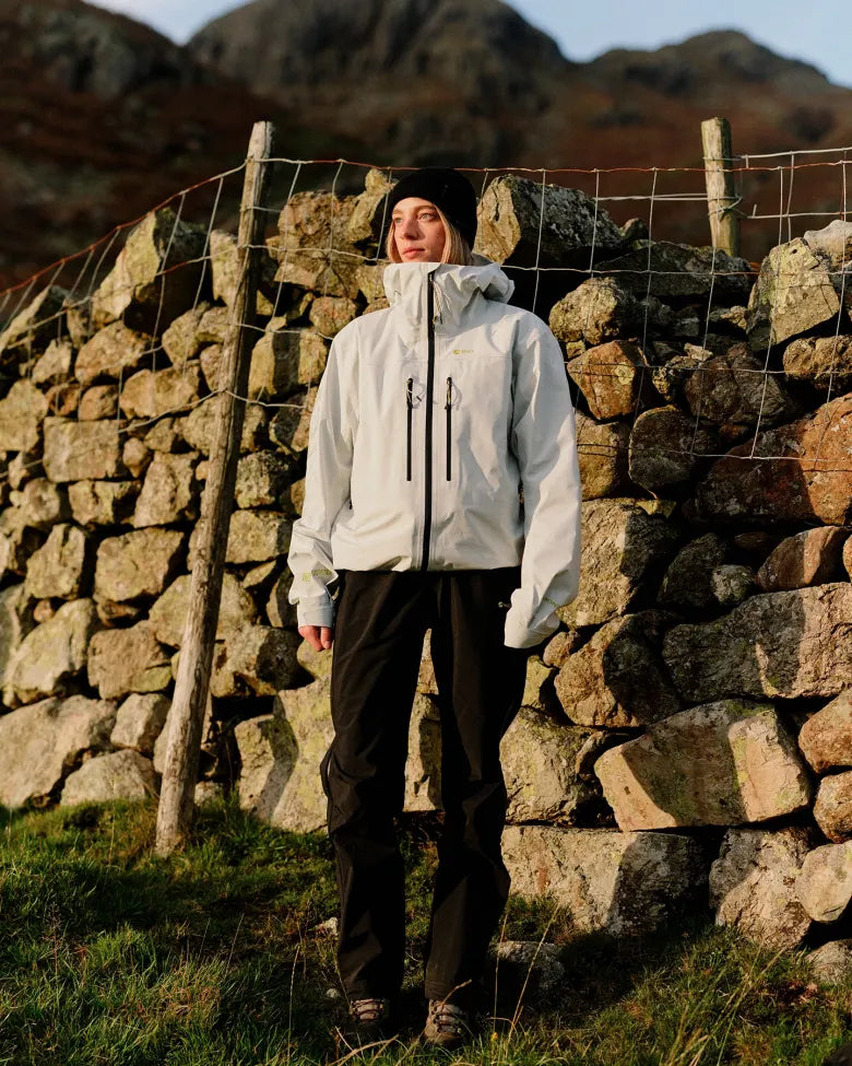 A lady wearing END. x Montane outerwear on a hike.