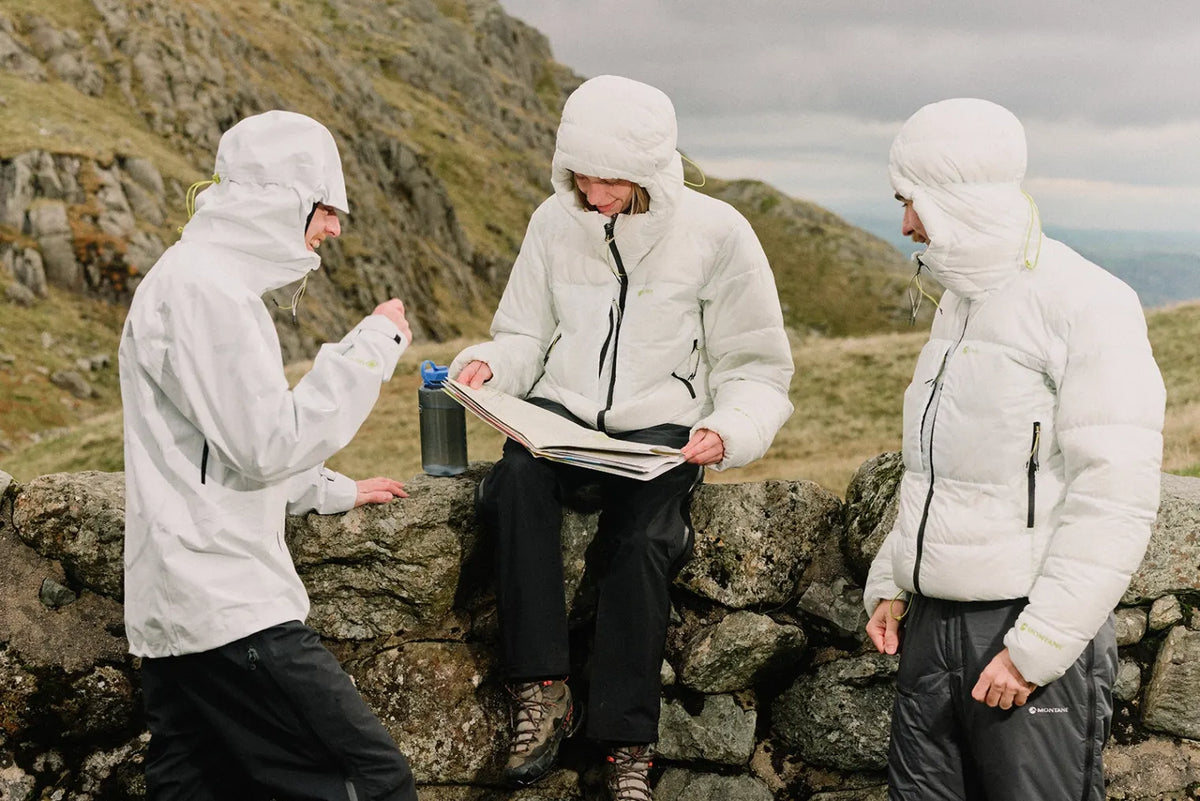 Three people wearing END. x Montane outerwear.