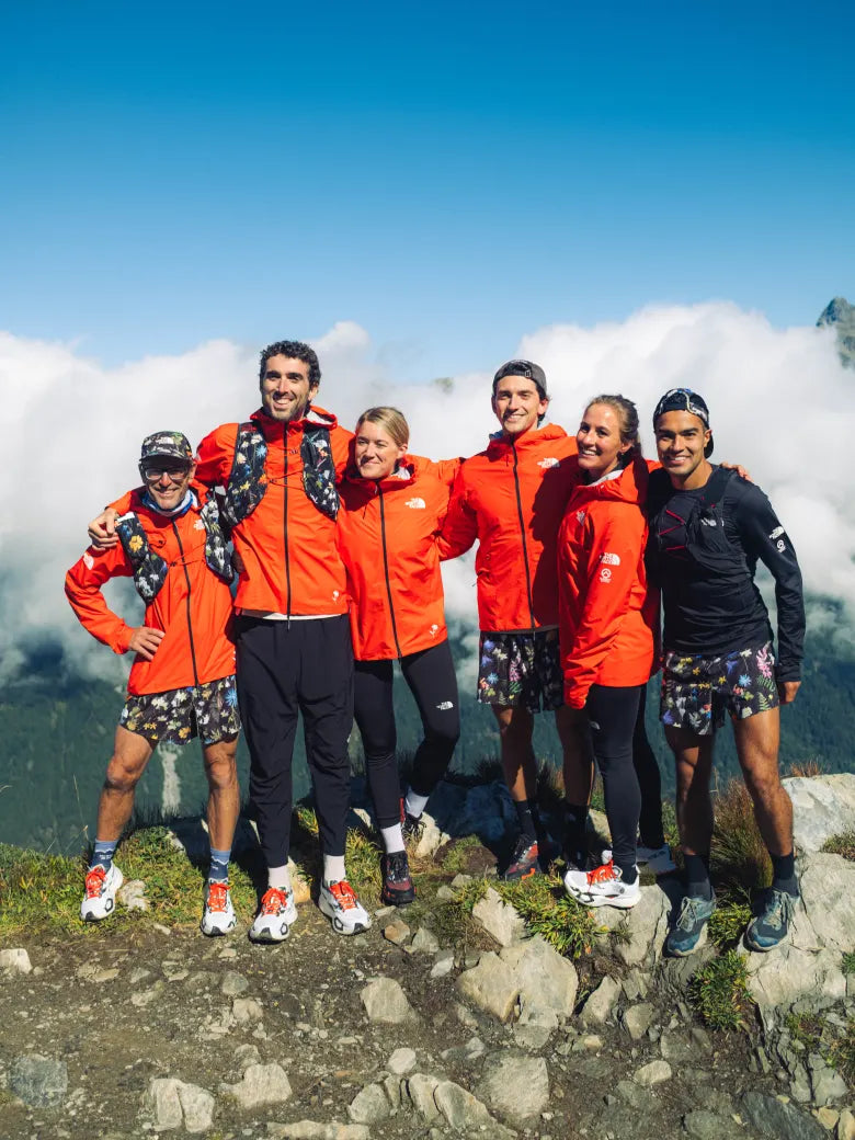 A group of people wearing The North Face on a mountain.