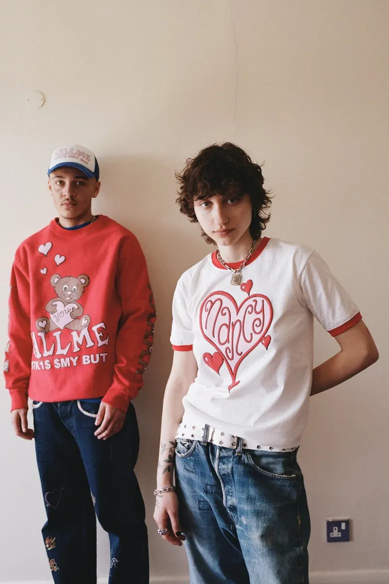 Models wearing t-shirts from Nancy
