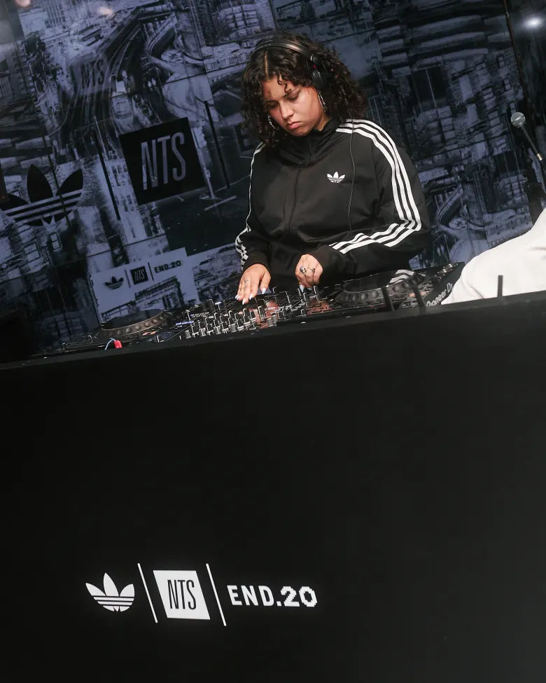 Woman DJ'ing at END. store