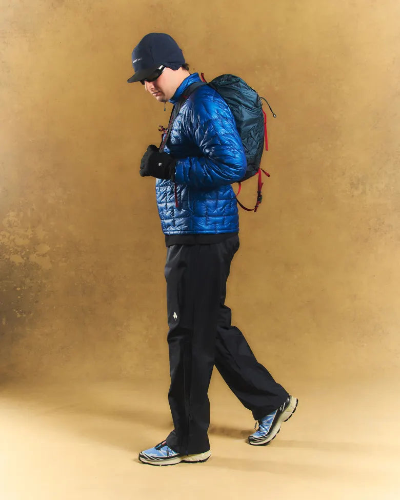 A man dressed for the outdoors.