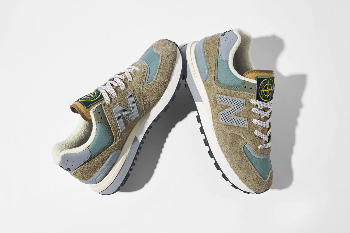 The Stone Island x New Balance 574 Legacy sneakers.