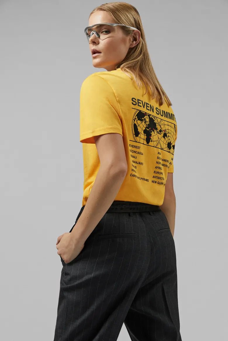 Woman wearing The North Face Seven Summits graphic tee