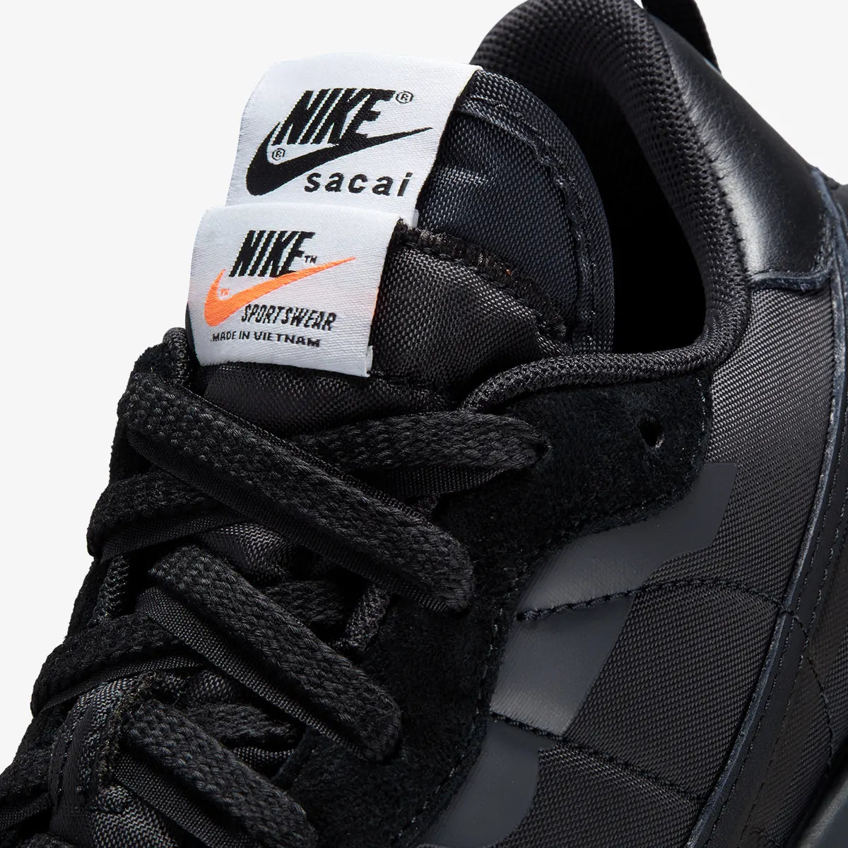 The lace detail of the Nike x Sacai Vaporwaffle sneakers.